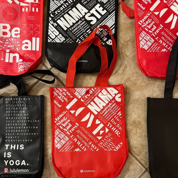 Bundle of 12 Lululemon bags all different colors. - Picture 1 of 2